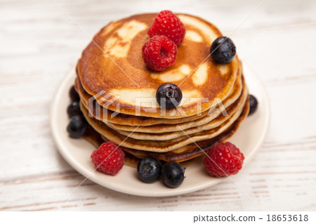 High pile of delicious pancakes High pile of delicious pancakes 18653618