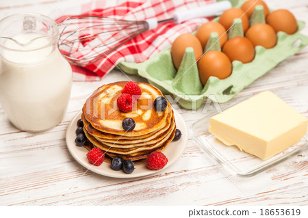 High pile of delicious pancakes High pile of delicious pancakes 18653619
