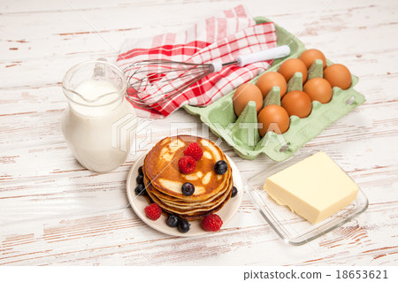 High pile of delicious pancakes High pile of delicious pancakes 18653621
