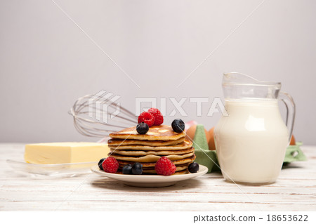 High pile of delicious pancakes High pile of delicious pancakes 18653622