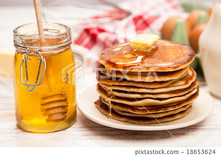 High pile of delicious pancakes High pile of delicious pancakes 18653624