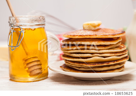 High pile of delicious pancakes High pile of delicious pancakes 18653625