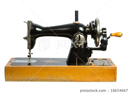 Old black sewing machine isolated ob white 18654667