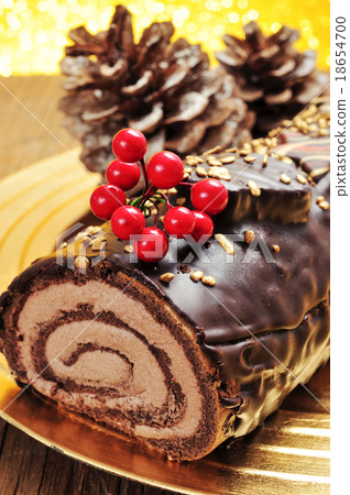 yule log cake, traditional of christmas time 18654700