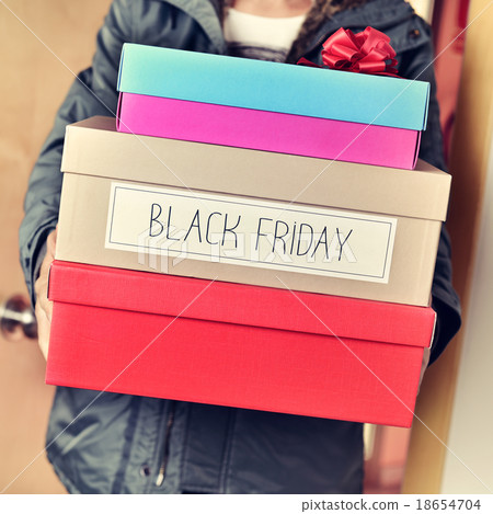 man with boxes with the text happy black friday 18654704
