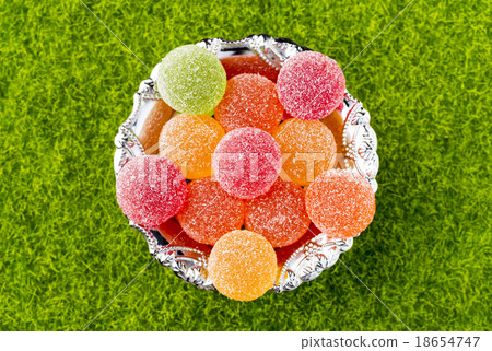 圖庫照片: colorful fruit jelly candies. top view