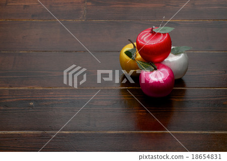 Apple decorations on wooden table Apple decorations on wooden table 18654831