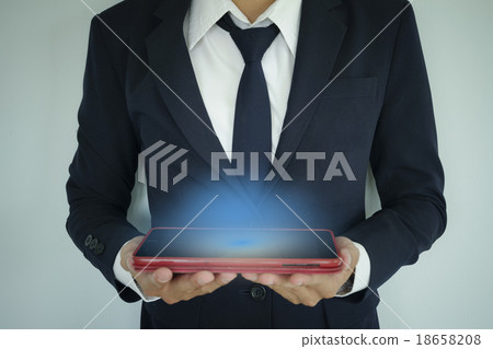 businessman holding tablet  light blue 18658208