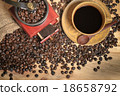 Still life of coffee beans in jute bag  18658792