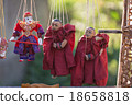 Traditional handicraft puppets are sold 18658818