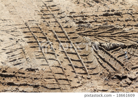 Wheel tracks on a dirt road Wheel tracks on a dirt road 18661609