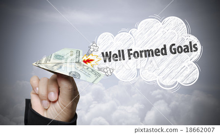hand holding dollar plane with coming soon text hand holding dollar plane with coming soon text 18662007