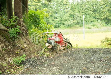 A cultivation machine waiting for a turn 18664668