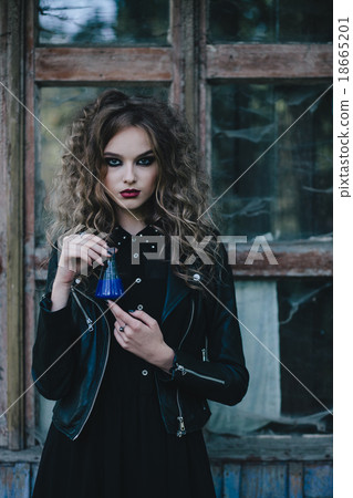 Vintage witch with elixir in hand 18665201