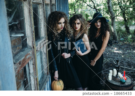 three vintage women as witches 18665433