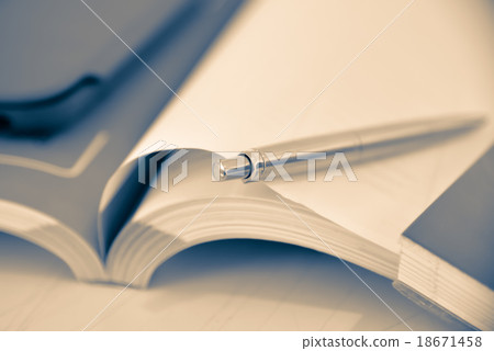 Pen put on book for work Pen put on book for work 18671458