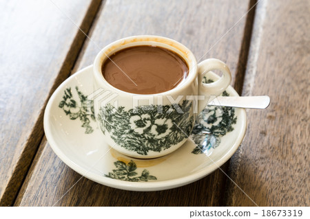 Traditional oriental Chinese coffee in vintage mug Traditional oriental Chinese coffee in vintage mug 18673319