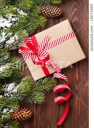 Christmas gift box and tree branch Christmas gift box and tree branch 18673989