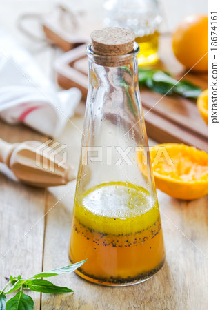 Orange salad dressing with poppy seed 18674161
