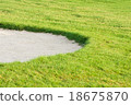 Sand bunkers with grass field 18675870