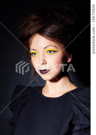 Woman in black dress 18675926