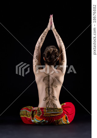 Yoga and mehndi. Image of topless woman meditating 18676882