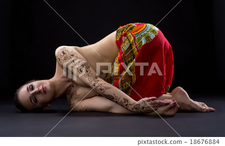 Yoga. Photo of beautiful woman with mehndi Yoga. Photo of beautiful woman with mehndi 18676884