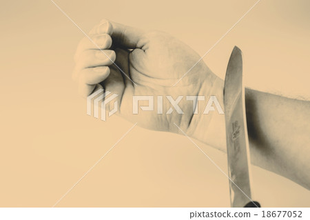 Close up of a suicidal man hand on isolated white Close up of a suicidal man hand on isolated white 18677052