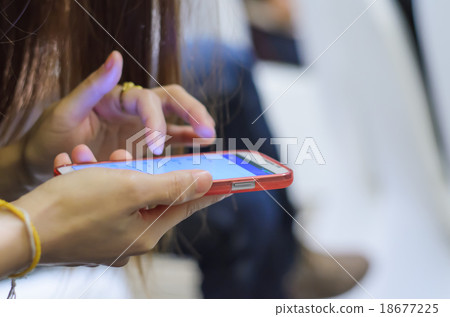Woman hand and mobile smart phone 18677225