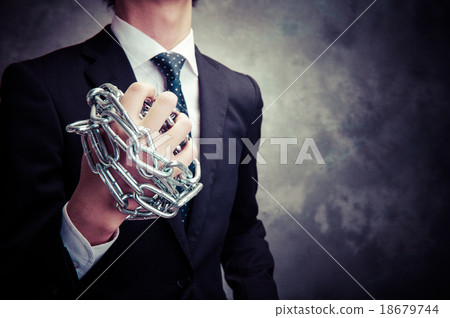A businessman wrapped in a chain 18679744