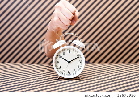 Hand that breaks the alarm clock 18679936