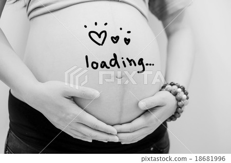 pregnant woman holding her belly pregnant woman holding her belly 18681996
