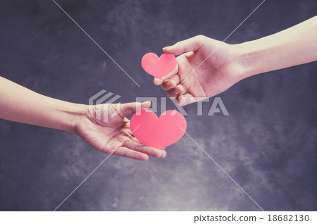 Human hand holding a red heart Human hand holding a red heart 18682130