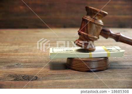Judges or Auctioneer Gavel And Money On Wood Table 18685308