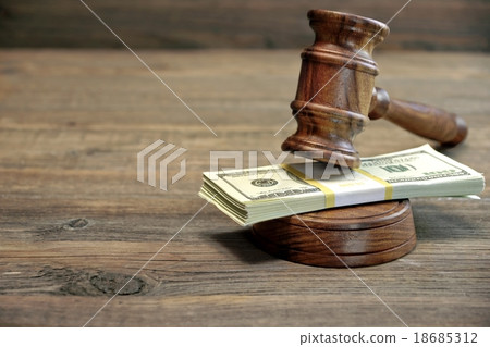 Judges Gavel And Bundle Of Money On The Table Judges Gavel And Bundle Of Money On The Table 18685312