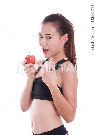 Fitness woman holding apple Fitness woman holding apple 18685731