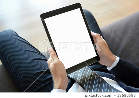 Businessman hands holding tablet computer Businessman hands holding tablet computer 18686598