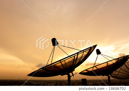 Satellite dish silhouette on twilight sky Satellite dish silhouette on twilight sky 18686702