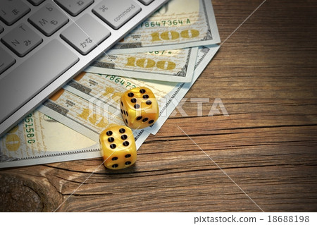 Keyboard, Gaming Dices And Cash On Wood Backgrou 18688198