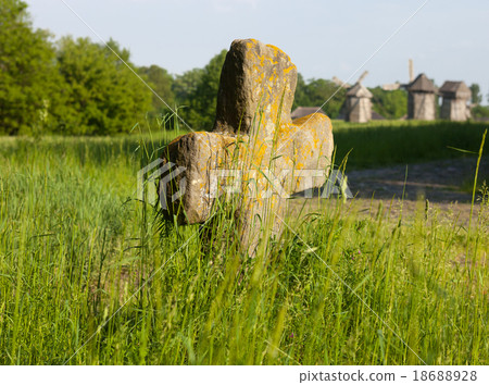 Old stone cross 18688928