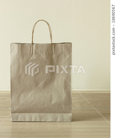 brown paper bag on the floor 18690567