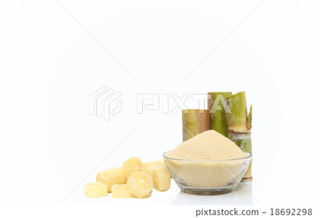 Brown Sugar in bowl and stump of sugar cane 18692298