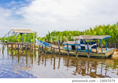 Flooded Boat on Coast After Tsunami 18697079