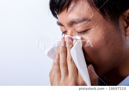 Male blowing nose 18697528