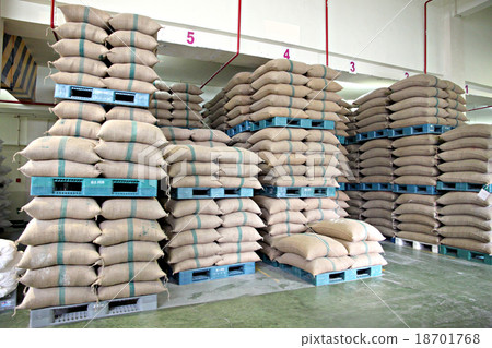 Stacked of Rice sacks in warehouse. Stacked of Rice sacks in warehouse. 18701768
