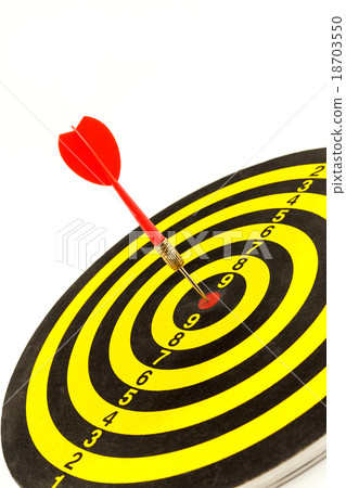 Red darts in bullseye of dartboard Red darts in bullseye of dartboard 18703550