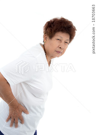 senior woman doing stretching exercise over white senior woman doing stretching exercise over white 18703663