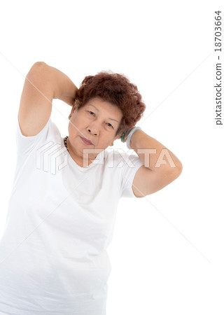 senior woman doing stretching exercise over white senior woman doing stretching exercise over white 18703664