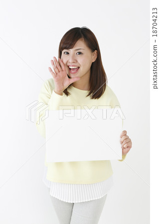 A woman with a message board 18704213