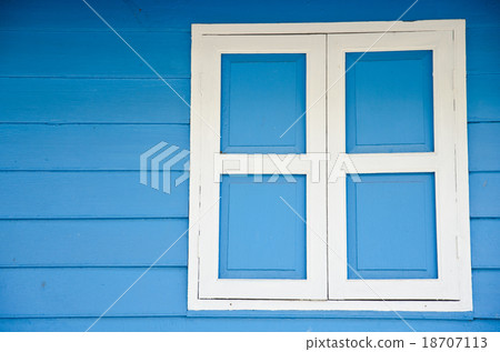 window is blue wall 18707113